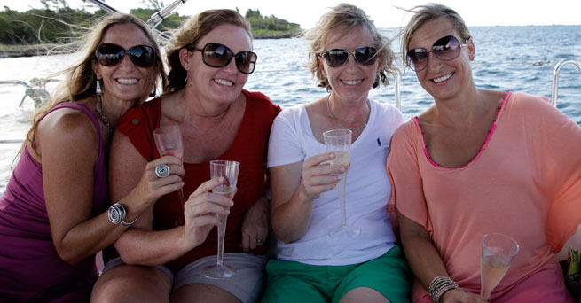 Celebrate 50 on a yacht sailing with friends, sunset, a rainbow and a super moon!